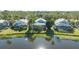 Aerial view of the home's backyard and lake view at 6523 Virginia Xing, University Park, FL 34201