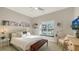 Charming bedroom with window seat and stylish decor at 6523 Virginia Xing, University Park, FL 34201