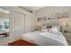 Bright bedroom with sliding door closet and window seat at 6523 Virginia Xing, University Park, FL 34201