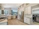 Bright kitchen with stainless steel appliances and white cabinets at 6523 Virginia Xing, University Park, FL 34201