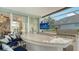 Outdoor bar with granite countertop and grill at 6523 Virginia Xing, University Park, FL 34201