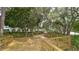 Peaceful wooden deck nestled within lush landscaping at 6523 Virginia Xing, University Park, FL 34201