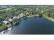 Aerial view of waterfront homes and lush landscaping at 6525 Berkshire Pl, University Park, FL 34201