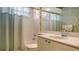 Clean bathroom with a shower/tub combo and updated vanity at 6525 Berkshire Pl, University Park, FL 34201