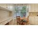 Charming kitchen nook with built-in seating and a window view at 6525 Berkshire Pl, University Park, FL 34201