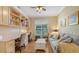 Bright office space with built-in bookshelves and hardwood floors at 6525 Berkshire Pl, University Park, FL 34201
