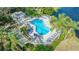 Resort-style pool and spa with lush landscaping at 6525 Berkshire Pl, University Park, FL 34201