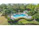 Community pool with spa, and pergola at 6525 Berkshire Pl, University Park, FL 34201