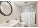 Clean bathroom with shower/tub combo, toilet, and vanity at 760 Village Cir # 109, Venice, FL 34292