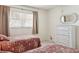 Two twin beds, a dresser, and window with blinds at 760 Village Cir # 109, Venice, FL 34292