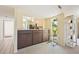 Breakfast bar with view into living room and kitchen at 760 Village Cir # 109, Venice, FL 34292