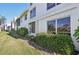 Exterior of condo building and landscaping at 760 Village Cir # 109, Venice, FL 34292