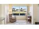 Home office with golf course view and built-in desk at 760 Village Cir # 109, Venice, FL 34292