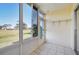 Sunroom with golf course view and storage at 760 Village Cir # 109, Venice, FL 34292