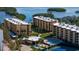 Aerial view of condo building with pool and tennis courts at 8779 Midnight Pass Rd # 504H, Sarasota, FL 34242