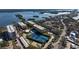 Aerial view of condo community with pool and tennis courts at 8779 Midnight Pass Rd # 504H, Sarasota, FL 34242