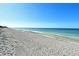 Expansive beach view with blue ocean at 8779 Midnight Pass Rd # 504H, Sarasota, FL 34242