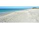 Expansive sandy beach with ocean view at 8779 Midnight Pass Rd # 504H, Sarasota, FL 34242