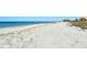 Expansive sandy beach with ocean view at 8779 Midnight Pass Rd # 504H, Sarasota, FL 34242