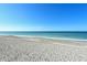 Expansive beach view with blue ocean at 8779 Midnight Pass Rd # 504H, Sarasota, FL 34242