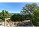 Wooden walkway leading to a dock on the water at 8779 Midnight Pass Rd # 504H, Sarasota, FL 34242