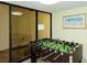 Game room with foosball table at 8779 Midnight Pass Rd # 504H, Sarasota, FL 34242