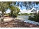 Kayaks and paddleboards on calm waters near a table at 8779 Midnight Pass Rd # 504H, Sarasota, FL 34242