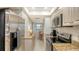 Modern kitchen featuring stainless steel appliances and granite counters at 8779 Midnight Pass Rd # 504H, Sarasota, FL 34242