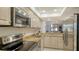 Well-equipped kitchen, granite counters, stainless steel appliances at 8779 Midnight Pass Rd # 504H, Sarasota, FL 34242