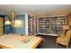 Relaxing library with a pool table and extensive bookshelves at 8779 Midnight Pass Rd # 504H, Sarasota, FL 34242