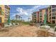 Community patio with grills and seating at 8779 Midnight Pass Rd # 504H, Sarasota, FL 34242