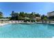 Inviting community pool with ample deck space at 8779 Midnight Pass Rd # 504H, Sarasota, FL 34242