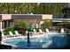 Community pool with surrounding lounge chairs and umbrellas at 8779 Midnight Pass Rd # 504H, Sarasota, FL 34242