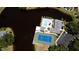 Community pool, tennis courts, and waterfront views at 11013 Jasmine Cir, Bradenton, FL 34209