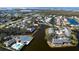Property is located on a waterfront lot with mature trees at 11013 Jasmine Cir, Bradenton, FL 34209
