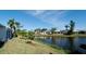 Waterfront backyard with lush landscaping at 11013 Jasmine Cir, Bradenton, FL 34209