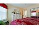Bright bedroom with dresser and bed at 11013 Jasmine Cir, Bradenton, FL 34209