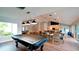 Community room with a pool table, kitchen and tables at 11013 Jasmine Cir, Bradenton, FL 34209