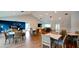 Bright community room with seating area at 11013 Jasmine Cir, Bradenton, FL 34209