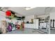 Garage with cabinets, laundry hookups, and storage at 11013 Jasmine Cir, Bradenton, FL 34209