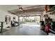 Garage with open door, view of residential street at 11013 Jasmine Cir, Bradenton, FL 34209