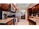 Updated kitchen with granite countertops and stainless steel appliances at 11013 Jasmine Cir, Bradenton, FL 34209