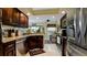 Updated kitchen featuring granite countertops and stainless steel appliances at 11013 Jasmine Cir, Bradenton, FL 34209