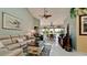 Spacious living room with a comfortable seating area and view of the canal at 11013 Jasmine Cir, Bradenton, FL 34209