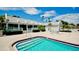 Inviting spa pool with tiled steps and seating at 11013 Jasmine Cir, Bradenton, FL 34209