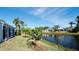 Home with backyard canal view, lush landscaping at 11013 Jasmine Cir, Bradenton, FL 34209