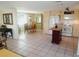 Bright kitchen featuring wood countertops and white appliances at 1270 Manor Rd, Englewood, FL 34223