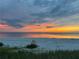 Stunning sunset view over the beach at 2310 Gulf N Dr # 205, Bradenton Beach, FL 34217