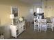Open concept kitchen with granite counters and stainless steel appliances at 2310 Gulf N Dr # 205, Bradenton Beach, FL 34217