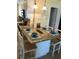 Kitchen with granite countertop island and seating for four at 2310 Gulf N Dr # 205, Bradenton Beach, FL 34217